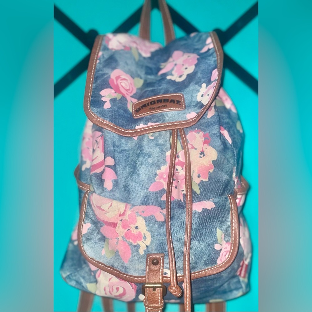 Union bay drawstring backpack faded blue denim and roses. Excellent condition